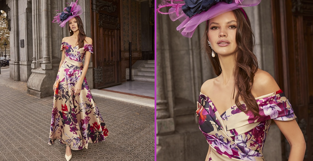 aw25 fb motb Mother of the bride outfits woman in a dress smiling and wearing a fascinator